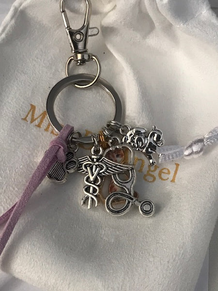 Porte-clés vétérinaire, breloque chat chien, caducée ailé sur bijou de sac, cadeau pour vétérinaire.